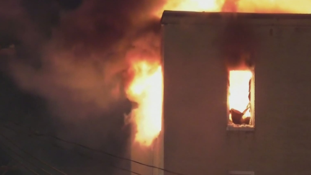 Residents rebuilding after fire destroys apartment on New Year's Eve