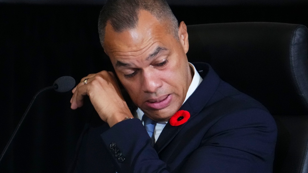 Former Ottawa police chief Peter Sloly wipes away tears as he get emotional while appearing as a witness at the Public Order Emergency Commission in Ottawa, on Friday, Oct. 28, 2022. THE CANADIAN PRESS/Sean Kilpatrick