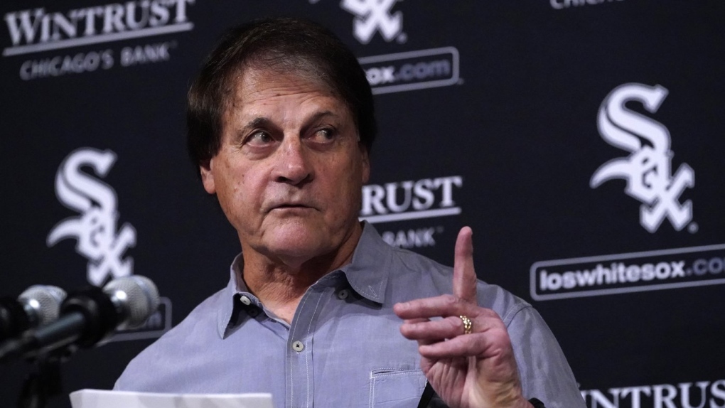 Chicago White Sox manager Tony La Russa reads from a statement announcing his retirement from the team due to medical reason before a baseball game between the White Sox and the Minnesota Twins, Oct. 3, 2022, in Chicago. (AP Photo/Charles Rex Arbogast)