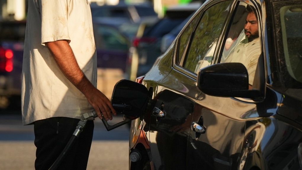 A motorist fuels up a vehicle at a Shell gas station, in Vancouver, Oct. 1, 2022. THE CANADIAN PRESS/Darryl Dyck