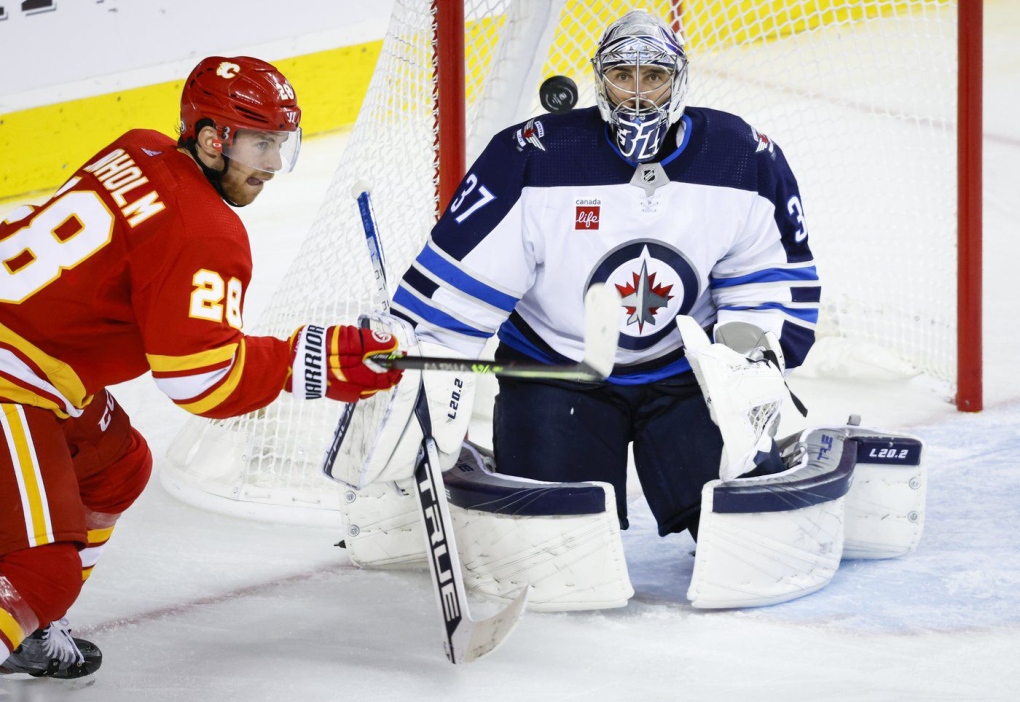 Flames beat Jets 3-2 to end 7-game skid