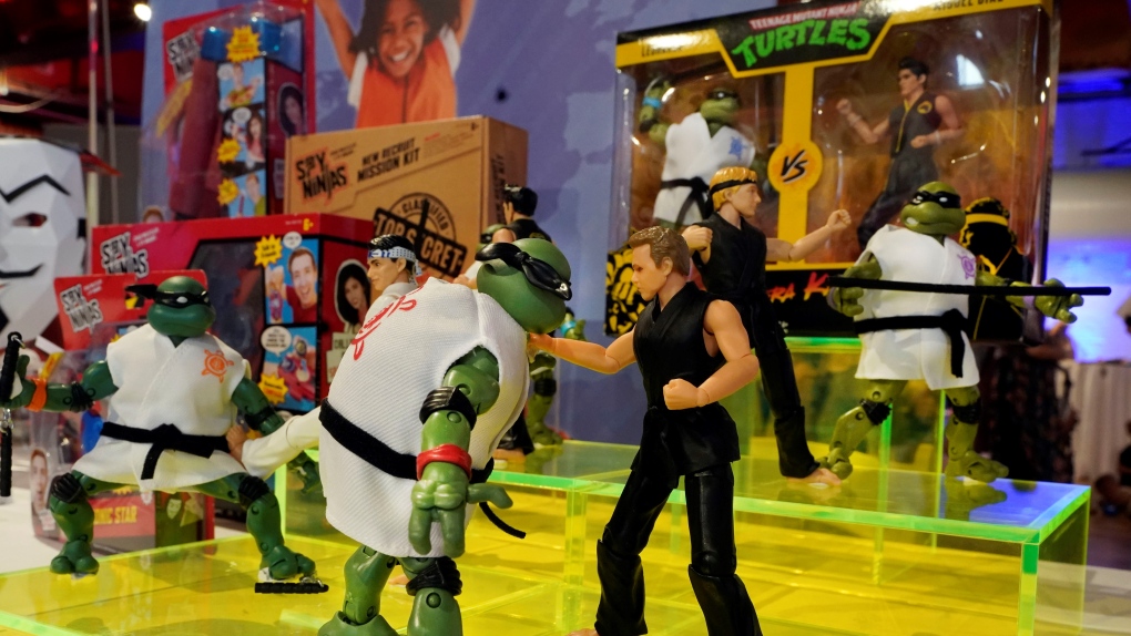 Teenage Mutant Ninja Turtles vs Cobra Kai, by Playmates, are displayed at the TTPM Holiday Showcase, in New York, Thursday, Sept. 23, 2021. (AP Photo/Richard Drew)