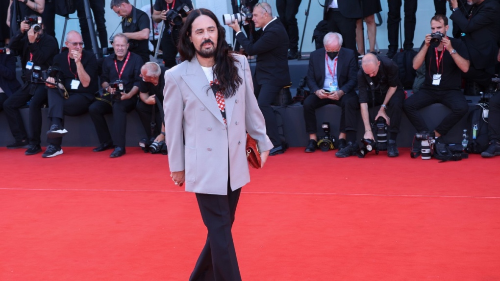Alessandro Michele poses for photographers upon arrival at the premiere of the film 'Don't Worry Darling' during the 79th edition of the Venice Film Festival in Venice, Italy, Sept. 5, 2022. (Photo by Joel C Ryan/Invision/AP)
