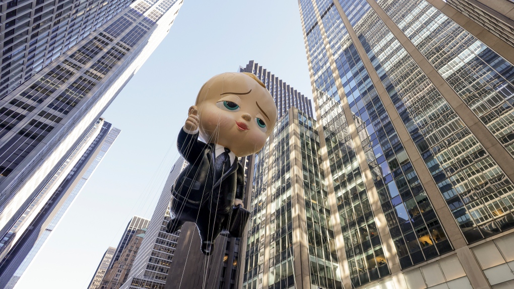 The Boss Baby balloon makes its way down Sixth Avenue during the Macy's Thanksgiving Day Parade, Thursday, Nov. 24, 2022, in New York. (AP Photo/Jeenah Moon)