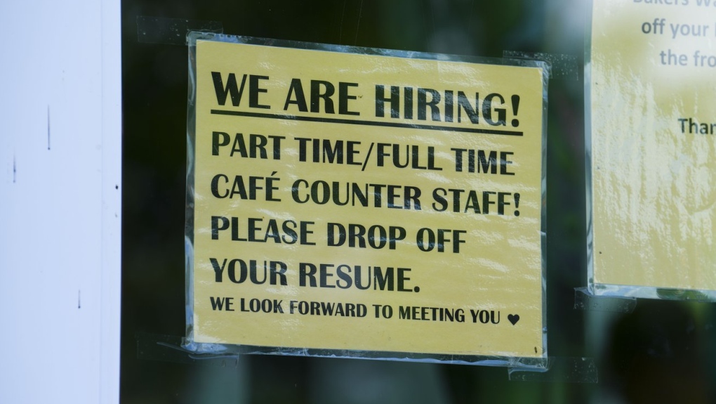 Statistics Canada says the the number of job vacancies was up 3.8 per cent in September at 994,800. A sign for help wanted is pictured in a business window in Ottawa on Tuesday, July 12, 2022. (THE CANADIAN PRESS/Sean Kilpatrick)