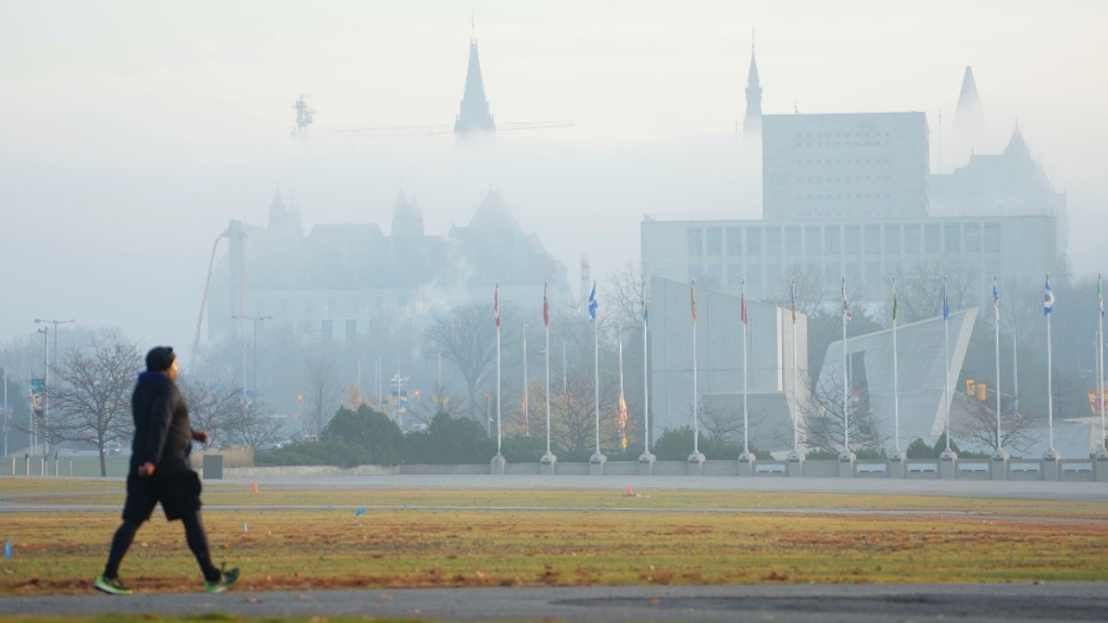 The Library and Archives, Parliament Hill and the Supreme Court of Canada are shrouded in fog in Ottawa, on Nov 4, 2022. THE CANADIAN PRESS/Sean Kilpatrick (Sean Kilpatrick / THE CANADIAN PRESS)