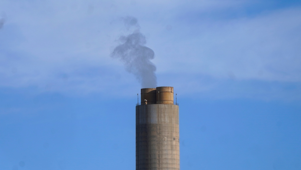 A smokestack stands at a coal plant on June 22, 2022, in Delta, Utah. NASA on Tuesday, Nov. 29, announced that its GeoCarb mission, which was supposed to be a low-cost satellite to monitor carbon dioxide, methane and how plant life changes over North and South America, was being killed because of cost overruns. (AP Photo/Rick Bowmer, File)