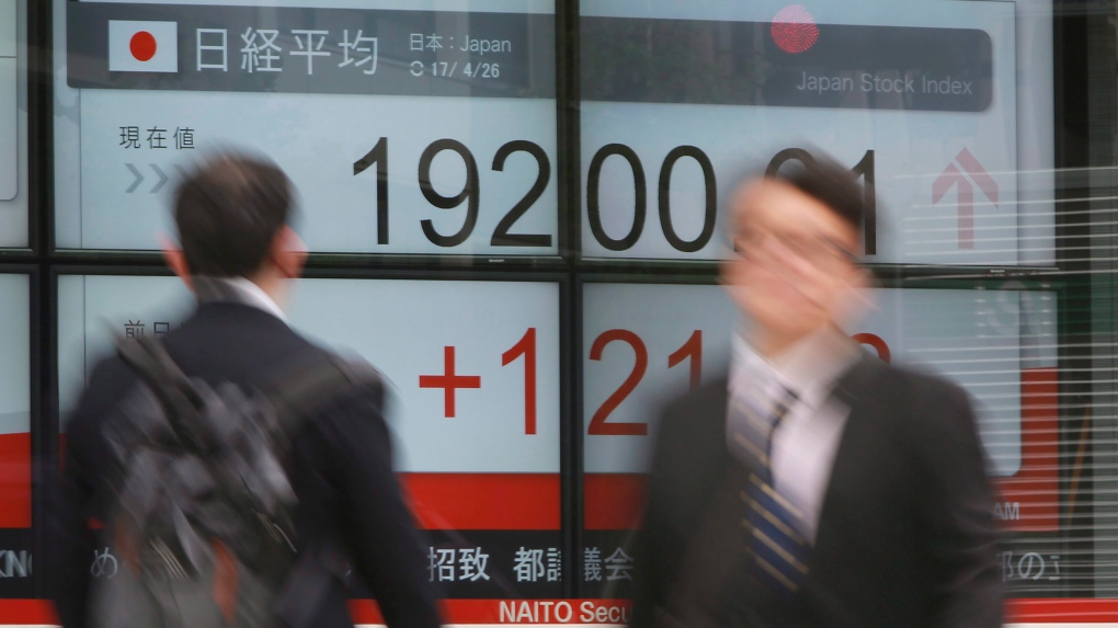 Asian shares higher in thin holiday trading