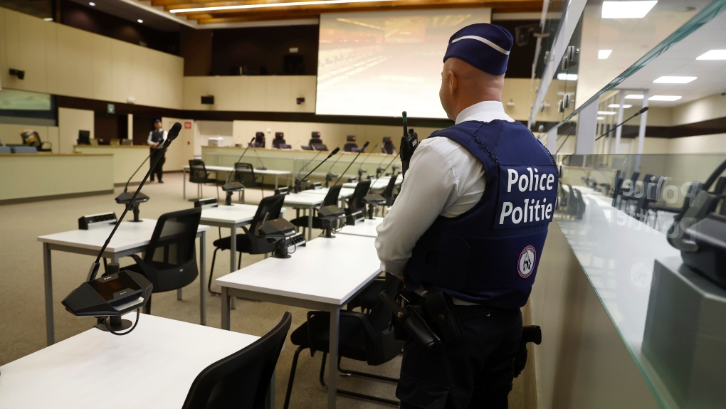 FILE - A police officer stands in the courtroom prior to the selection of the jury for the 2016 Brussels and Maelbeek attacks trial at the Justitia building in Brussels, Nov. 30, 2022. (Stephanie Lecocq/Pool Photo via AP, file)