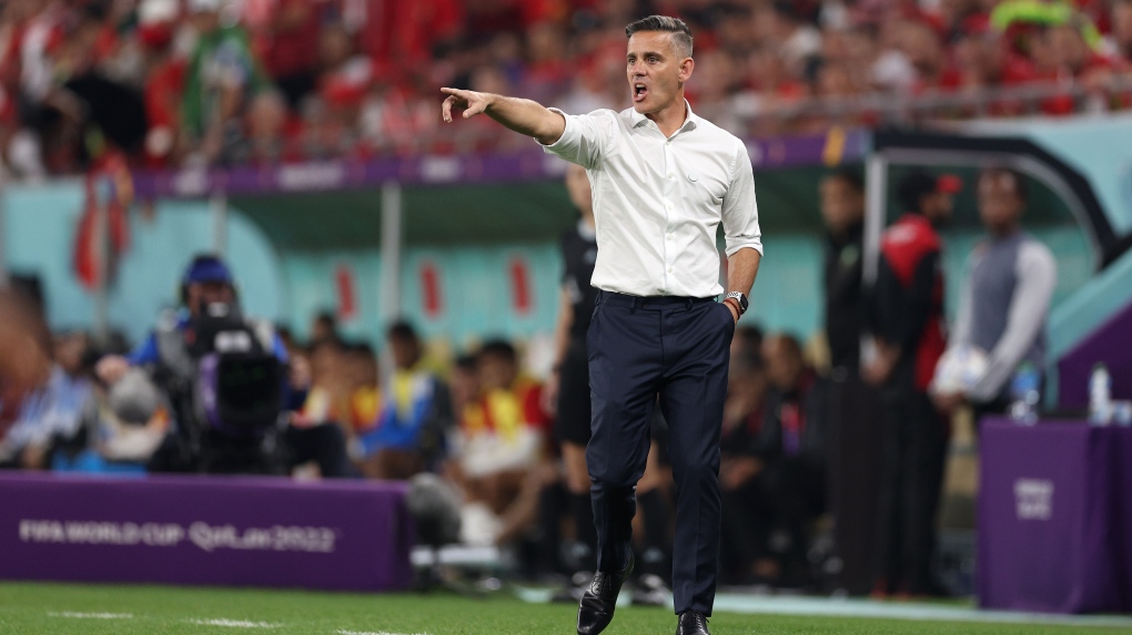 John Herdman, Head Coach of Canada, gives the team instructions during the FIFA World Cup Qatar 2022 Group F match between Canada and Morocco at Al Thumama Stadium on Dec. 01, 2022 in Doha, Qatar. (Photo by Richard Heathcote/Getty Images)