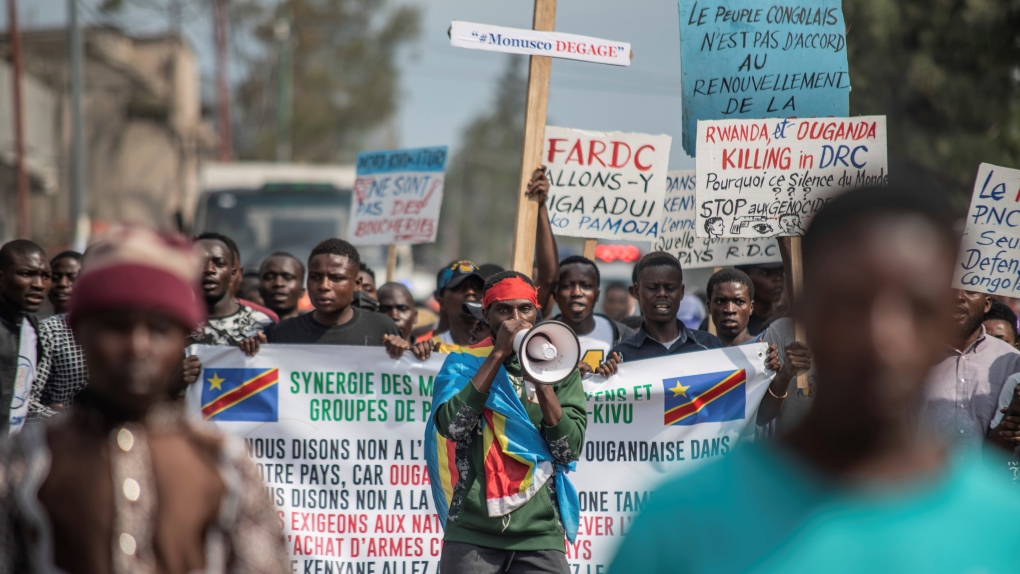 Goma residents join in a protest called by the civil society against the United Nations mission to the Democratic Republic of Congo and the current conflict between government forces and M23 rebels, in Goma, Thursday, Dec. 1, 2022. (AP Photo/Moses Sawasawa) 