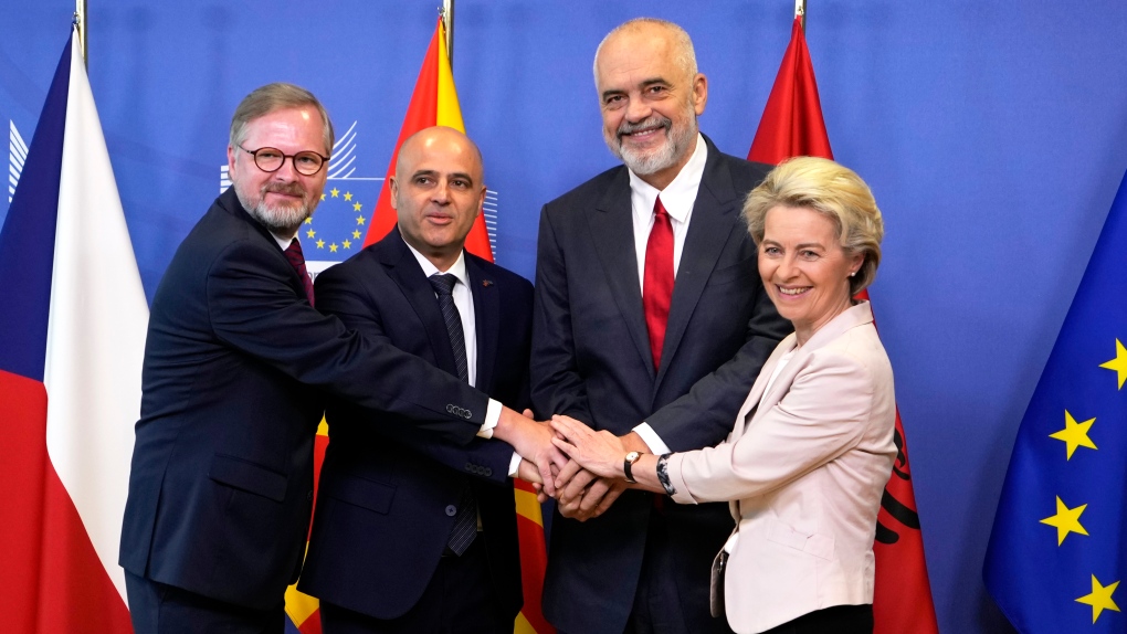 From right, European Commission President Ursula von der Leyen, Albanian Prime Minister Edi Rama, North Macedonia's Prime Minister Dimitar Kovacevski and Czech Republic's Prime Minister Petr Fiala shake hands prior to a meeting at EU headquarters in Brussels, on July 19, 2022. (AP Photo/Virginia Mayo, File)