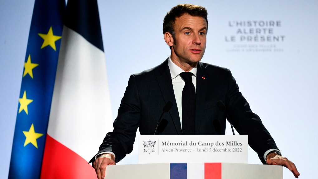 French President Emmanuel Macron delivers a speech at the Camp des Milles memorial site in Aix-en-Provence, southern France, Monday, Dec.5, 2022. (Christophe Simon, Pool via AP)