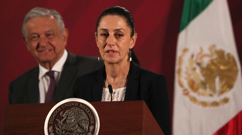 In this file photo, Mexico City's Mayor Claudia Sheinbaum speaks to the press regarding the spread of the new coronavirus, as Mexico's President Andres Manuel Lopez Obrador stand behind, early Thursday, March 19, 2020. (AP Photo/Fernando Llano)