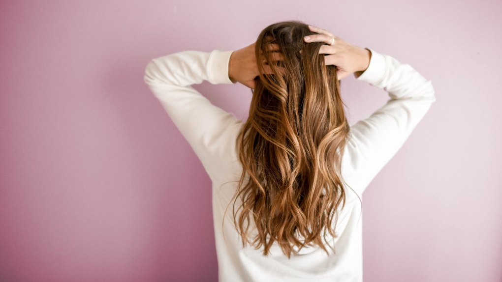 More than half of postmenopausal women experience hair loss: study | CTV  News