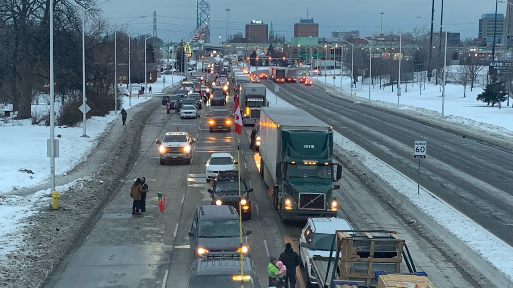 Supporters of trucker convoy delay traffic at Canada's busiest border crossing