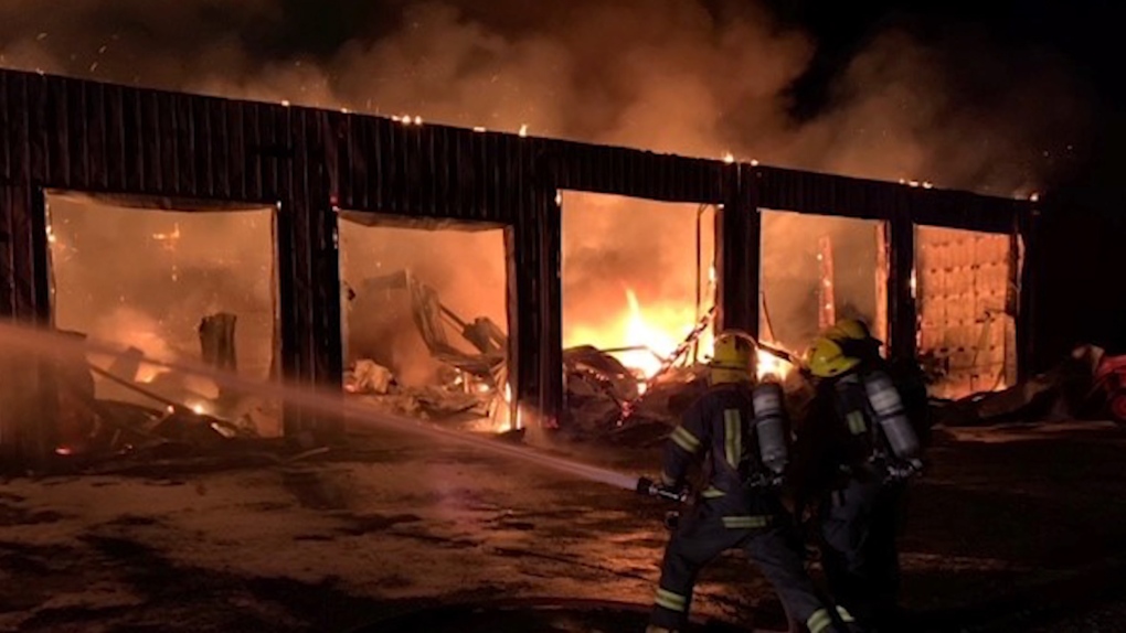 Massive fire destroys Langley barn with trucks, RVs inside