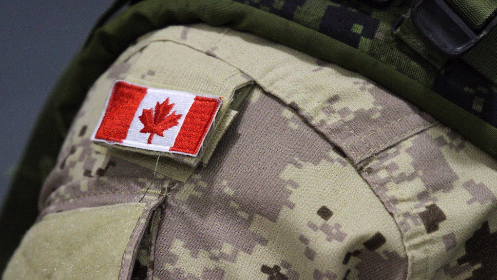 A Canadian flag patch is shown on a soldier's shoulder in this 2014 file photo. THE CANADIAN PRESS/Lars Hagberg