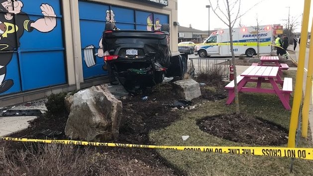Charges laid after car flips over at Waterloo plaza CTV News pic