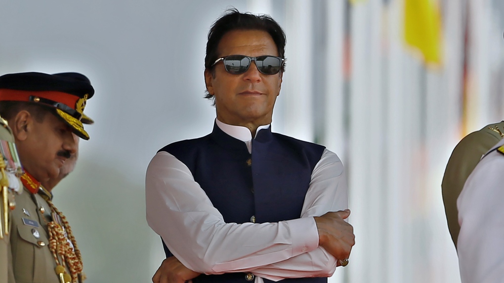 Pakistan's Prime Minister Imran Khan attends a military parade to mark Pakistan National Day, in Islamabad, Pakistan, Wednesday, March 23, 2022. (AP Photo / Anjum Naveed, File)