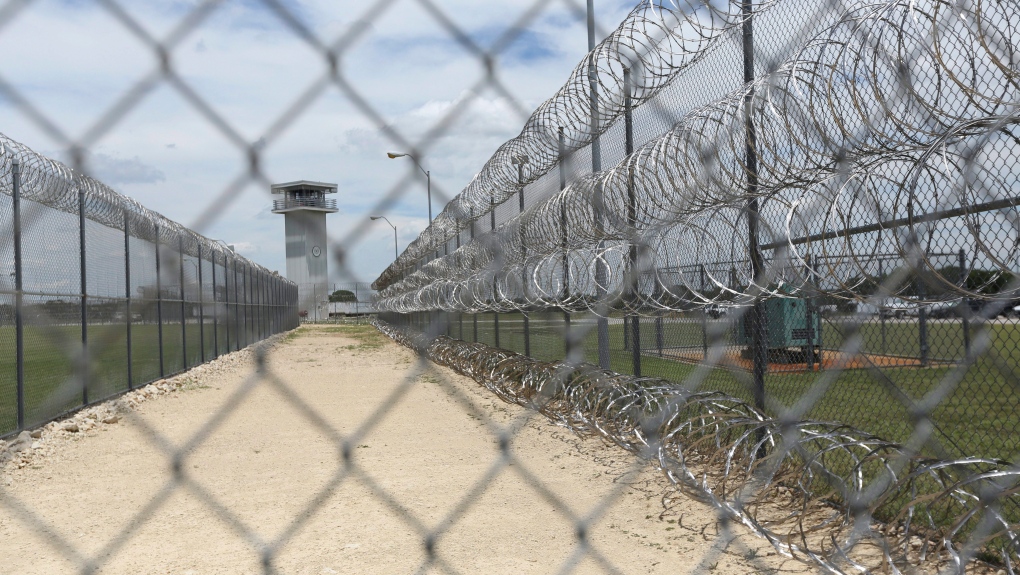 Wednesday, June 21, 2017 photo shows barbed wire surrounding a prison Gatesville, Texas. (AP Photo/Jaime Dunaway)