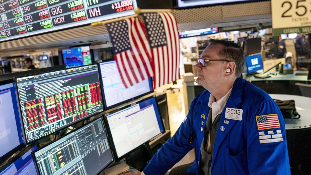 Trader Patrick King works the floor at the New York Stock Exchange, May 12, 2022, in New York. (AP Photo/John Minchillo)