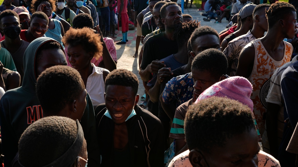 Haitians wait to be processed and receive medical attention at a tourist campground in the province of Villa Clara, Wednesday, May 25, 2022.  (AP Photo Ramon Espinosa)