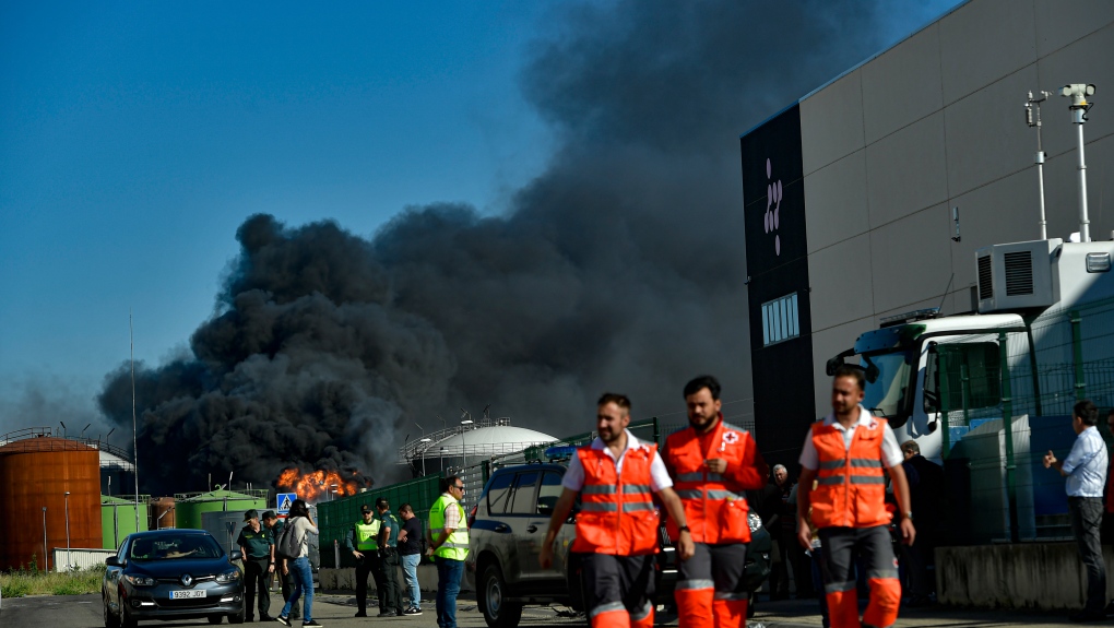 Black smoke billows from a biodiesel production plant in Calahorra, northern Spain, Thursday, May 26, 2022. (AP Photo/Alvaro Barrientos)