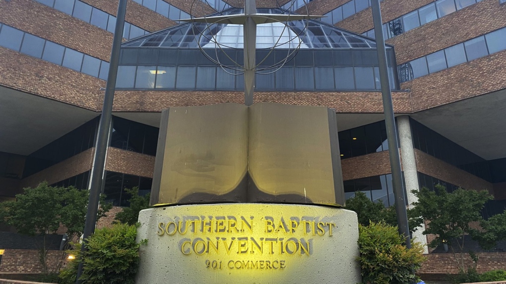 A cross and Bible sculpture stand outside the Southern Baptist Convention headquarters in Nashville, Tenn., May 24, 2022. (AP Photo/Holly Meyer)
