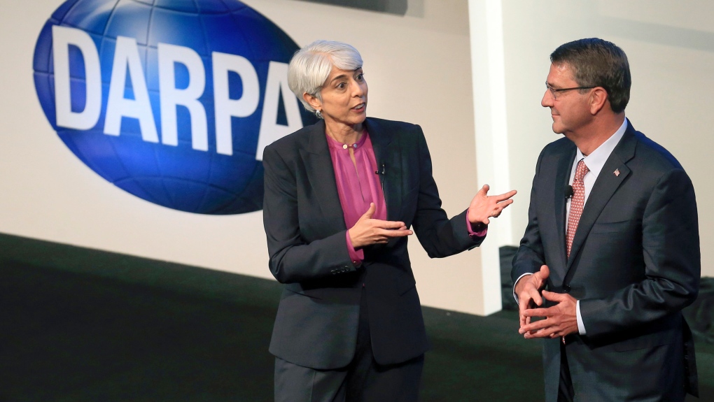 Arati Prabhakar, left, the director of Defense Advanced Research Projects Agency speaks after introducing then-Defense Secretary Ash Carter to speak Sept. 9, 2015, at the opening of the DARPA conference at the America's Center in St. Louis. (Christian Gooden/St. Louis Post-Dispatch via AP, File)