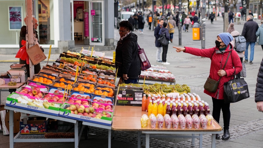 Fruits and vegetables for sale in a Berlin street market, on April 1, 2022. (Pavel Golovkin / AP) 