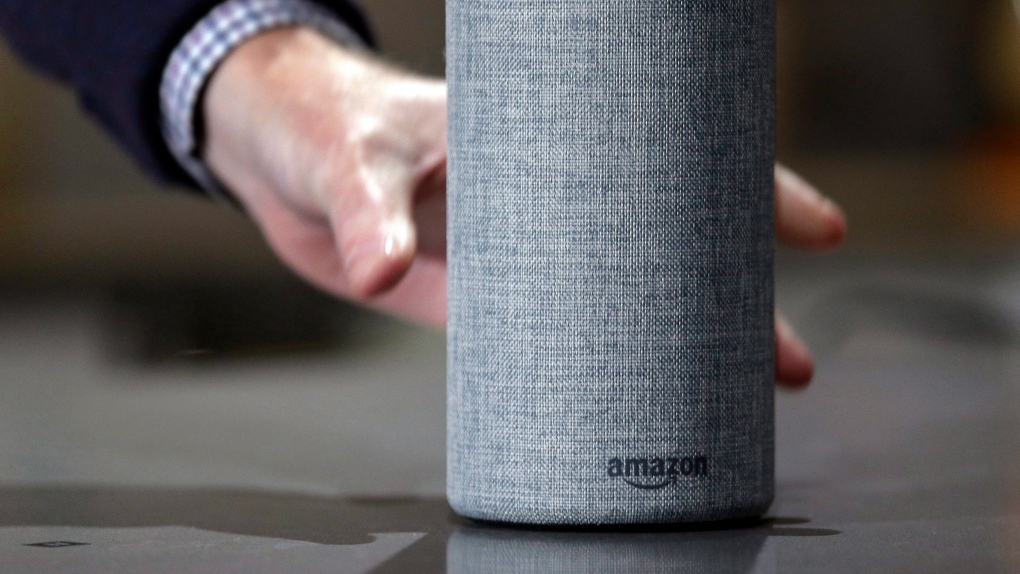 The Amazon Echo is displayed during a program announcing several new Amazon products by the company, in Seattle. (AP Photo/Elaine Thompson, File)