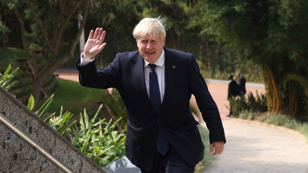 Britain's Prime Minister Boris Johnson arrives for the Leaders' Retreat on the sidelines of the Commonwealth Heads of Government Meeting at Intare Conference Arena in Kigali, Rwanda, Saturday, June 25, 2022. (Dan Kitwood/Pool Photo via AP)