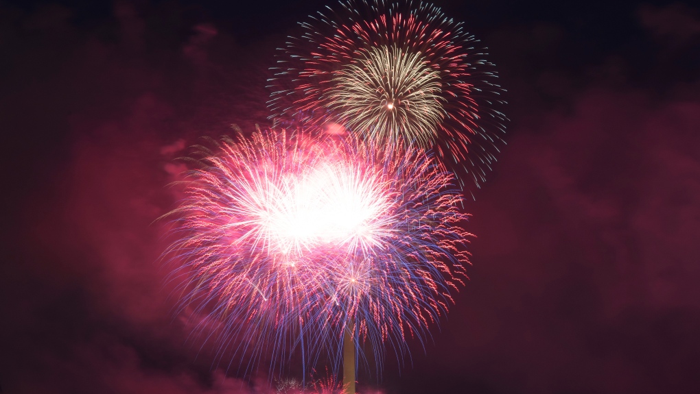 Fireworks explode over Lincoln Memorial, Washington Monument and U.S. Capitol, at the National Mall, during the Independence Day celebrations, in Washington, on Sunday, July 4, 2021 (AP Photo/Jose Luis Magana)