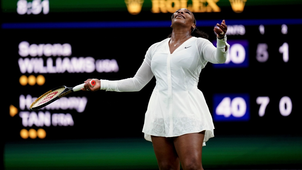 Serena Williams of the U.S. reacts as she plays France's Harmony Tan in a first round women's singles match on day two of the Wimbledon tennis championships in London, Tuesday, June 28, 2022. (John Walton/PA via AP)