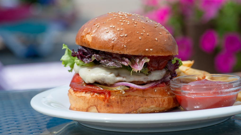 Undated photo of a burger with vegetables. (Photo by Ruslan Khmelevsky/Pexels)