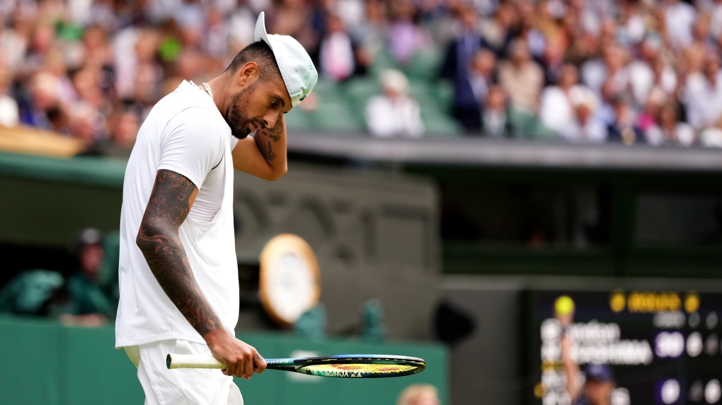 Australia's Nick Kyrgios prepares to serve to Brandon Nakashima of the US in a men's singles fourth round match on day eight of the Wimbledon tennis championships in London, Monday, July 4, 2022. (AP Photo/Alberto Pezzali)