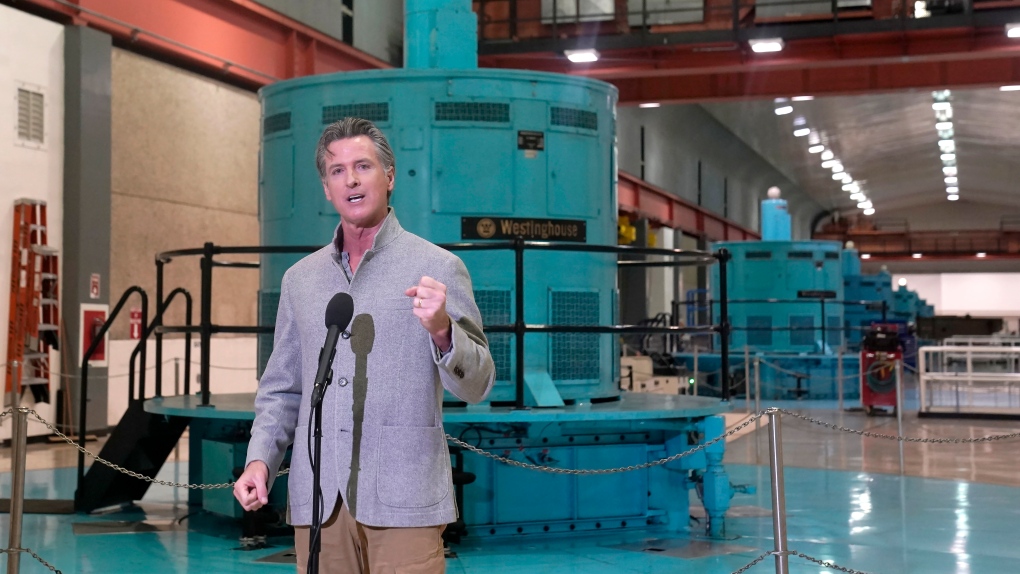 California Gov. Gavin Newsom discusses the effect of the drought on power generation after touring the Edward Hyatt Power Plant at the Oroville Dam, in Oroville, Calif., on April 19, 2022. (AP Photo/Rich Pedroncelli, File)