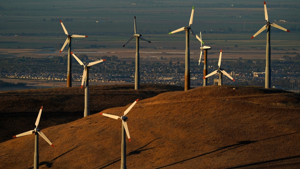 Wind turbines work in Livermore, Calif., Aug. 10, 2022. (AP Photo/Godofredo A. Vasquez)