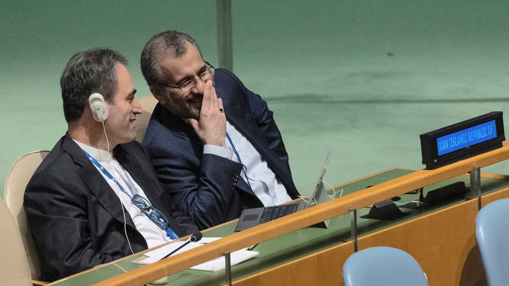 Iran's delegates look at each other while U.S. Secretary of State Antony J. Blinken addresses the 2022 Nuclear Non-Proliferation Treaty (NPT) review conference, in the United Nations General Assembly, Aug. 1, 2022. (AP Photo/Yuki Iwamura, File)
