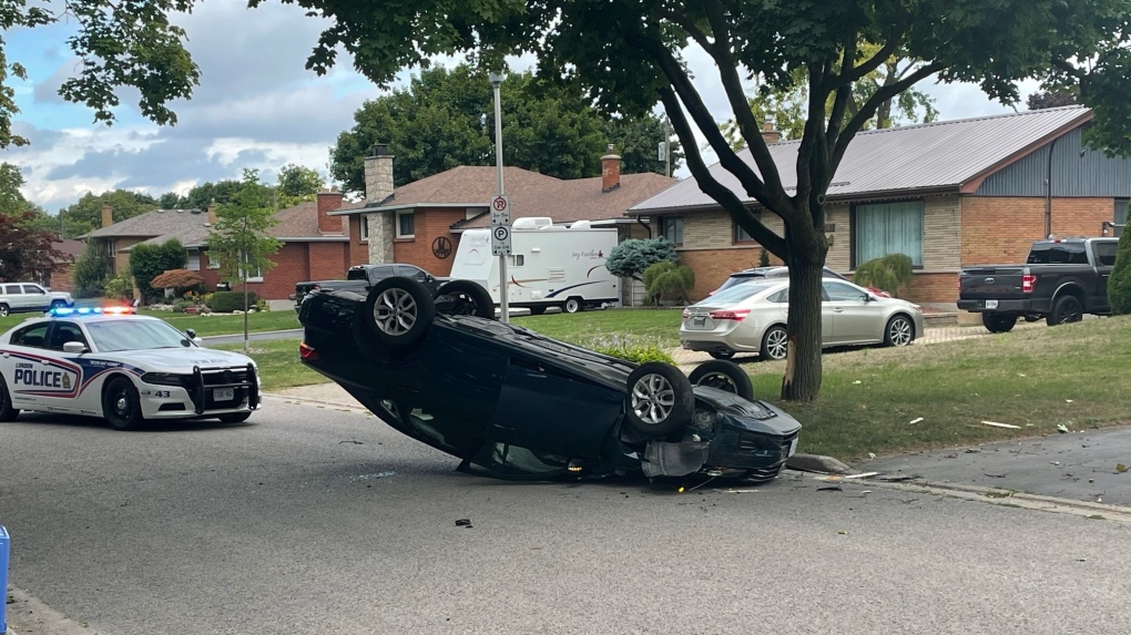 Vehicle ends up on roof after swerving to avoid animal in east London neighbourhood