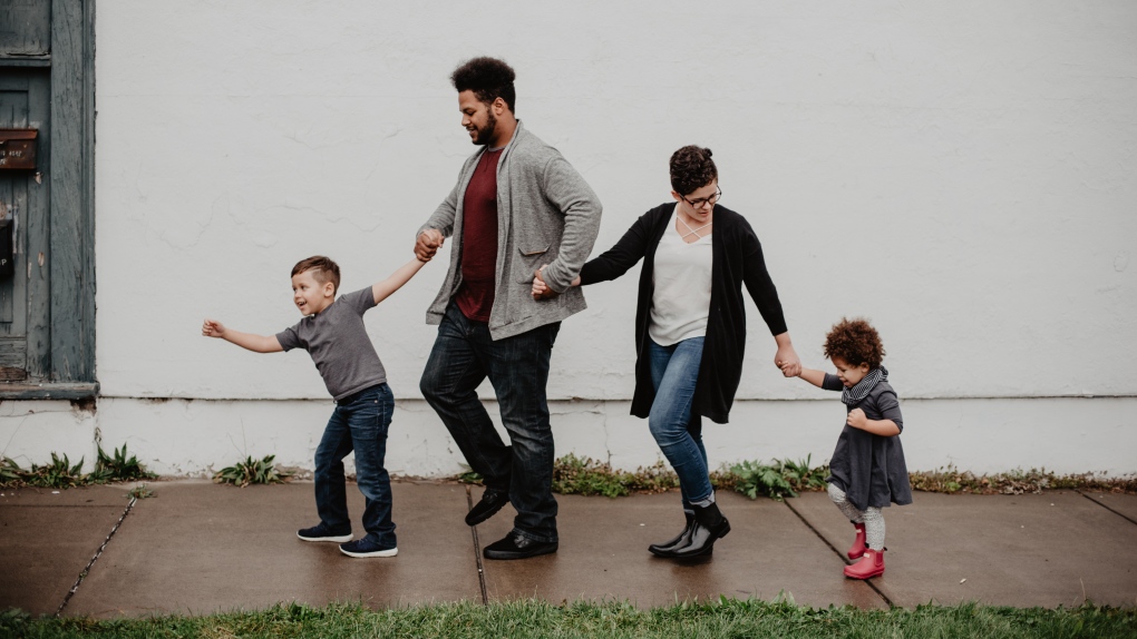 A family of four is seen in this file photo. (Photo by Emma Bauso via Pexels)