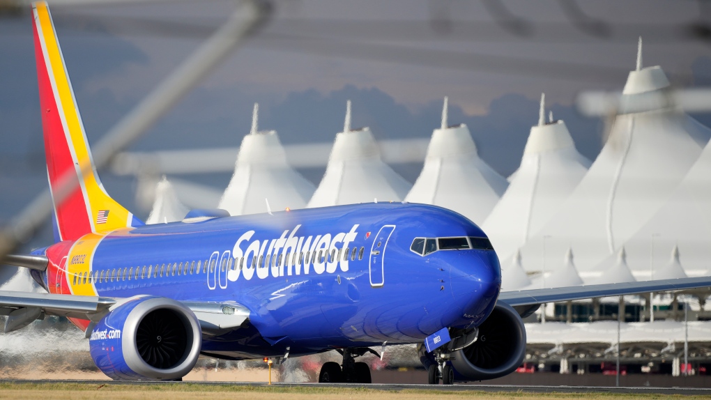 Southwest Airlines jetliner taxis down a runway to take off from Denver International Airport, July 5, 2022, in Denver. (AP Photo/David Zalubowski)