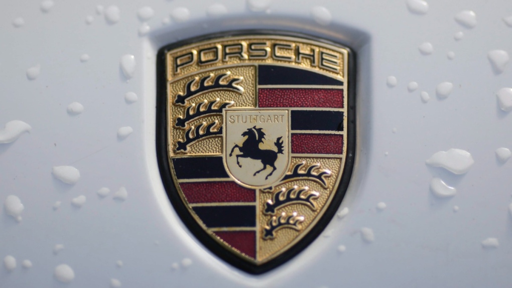 The brand logo of German car maker Porsche is photographed on a car in Berlin, on Aug. 1, 2017. (Markus Schreiber / AP) 
