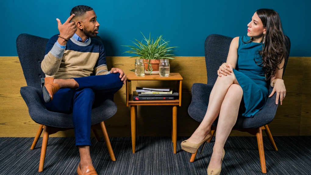Undated photo of a man and woman engaging in a conversation. (Jopwell/Pexels)
