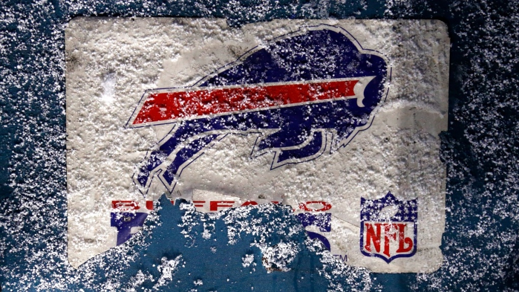 Snow falls on a Buffalo Bills logo at Bills Stadium, on Jan. 16, 2021. (Jeffrey T. Barnes / AP) 