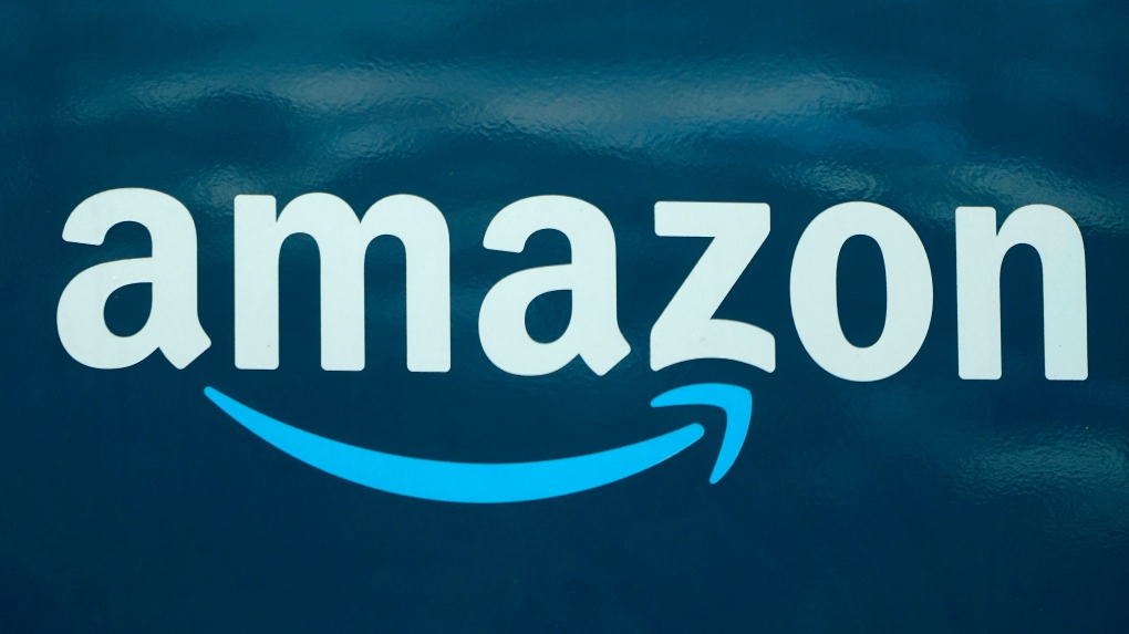 FILE - An Amazon logo appears on an Amazon delivery van in Boston, Oct. 1, 2020. (AP Photo/Steven Senne, File)