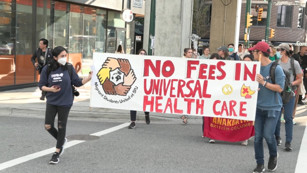 Dozens rally in Vancouver to demand end of health-care fees for international students