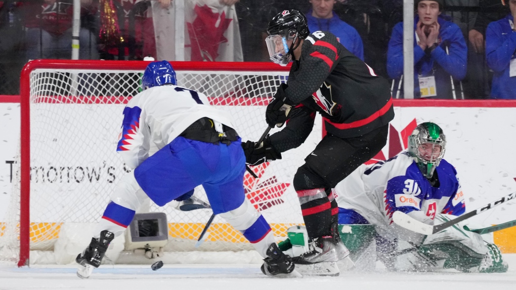 Bedard bedazzles, breaks 5 records as Canada eliminates Slovakia with overtime win