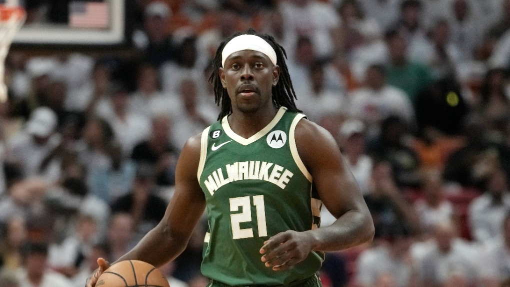 Milwaukee Bucks guard Jrue Holiday moves the ball down the court during the first half of Game 3 in a first-round NBA basketball playoff series against the Miami Heat, April 22, 2023, in Miami. Holiday is being traded to the Boston Celtics, a person with knowledge of the agreement said Sunday, Oct. 1 2023, a move that comes just four days after being sent to the Portland Trail Blazers in the deal that sent Damian Lillard to the Bucks. (AP Photo/Lynne Sladky)
